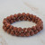 Sunstone beaded stretch bracelets, 'Strength and Energy' (pair) - Two Sunstone Beaded Stretch Bracelets from Brazil