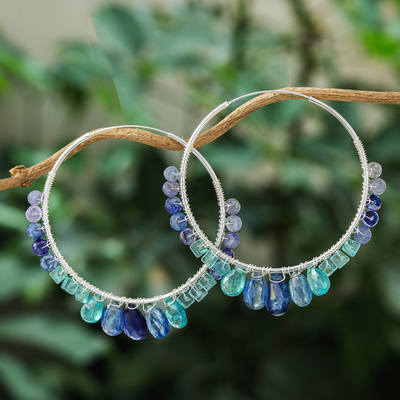 Multi-gemstone hoop earrings, 'Following Sea' - Continuous Hoop Earrings in Silver with Blue Gemstones