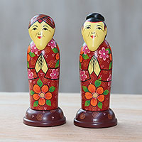 Mahogany toothpick holders, 'Elderly Friends in Red' (pair) - Pair of Mahogany Toothpick Holders in Floral Red from Bali