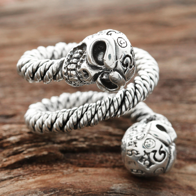 Men's sterling silver wrap ring, 'Snaking Skulls' - Men's Sterling Silver Skull Wrap Ring from India