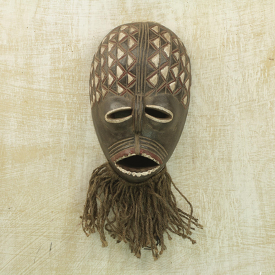 Máscara de madera africana - Máscara de pared de yute y madera de Sese tallada a mano en África Occidental