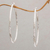 Sterling silver half-hoop earrings, 'Glimmering Memories' - Sterling Silver Hammered Motif Half-Hoop Earrings from Bali