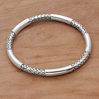 Sterling silver bangle bracelet, 'Bali Show' - Sterling Silver Woven Motif Bangle Bracelet by Bali Artisans