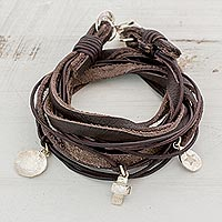 Fine silver and leather wrap bracelet, 'Stellar Imprint' - Leather Fine Silver Wrap Charm Bracelet from Guatemala