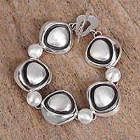 Sterling silver link bracelet, 'Abstract Eyes' - Abstract Sterling Silver Link Bracelet from Mexico