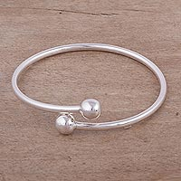 Sterling silver wrap bracelet, 'Irresistible' - Peruvian Sterling Silver Modern Wrap Bracelet