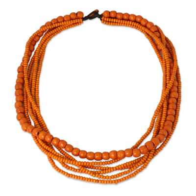 Wood beaded necklace, 'Solar Dance' - Orange Wood Bead Necklace Hand Crafted in Thailand