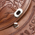 Leather sling shoulder bag, 'Andean Tale' - Hand-Tooled Embossed Andean Scene Brown Leather Shoulder Bag