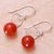 Carnelian dangle earrings, 'Ring Shimmer' - Round Carnelian Dangle Earrings Crafted in Thailand