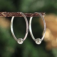 Sterling silver hoop earrings, 'Luminous Orbits' - Artisan Crafted Sterling Silver Hoop Earrings from Peru