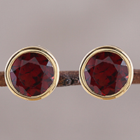 Gold plated garnet stud earrings, 'Sparkling World' - Handcrafted 22k Gold Plated Faceted Garnet Stud Earrings