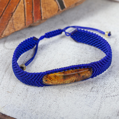 Amber pendant bracelet, 'Electrum in Blue' - Ultramarine Macrame Bracelet with Amber Pendant