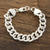 Men's sterling silver chain bracelet, 'Appealing Links' - Men's Sterling Silver Cuban Link Chain Bracelet from India