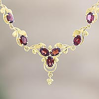 Gold-plated garnet pendant necklace, 'Golden Botanicals' - Handmade Gold-Plated Garnet Pendant Necklace
