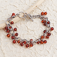 Carnelian beaded bracelet, 'Cloudburst in Orange' - Hand Crafted Carnelian and Sterling Silver Beaded Bracelet