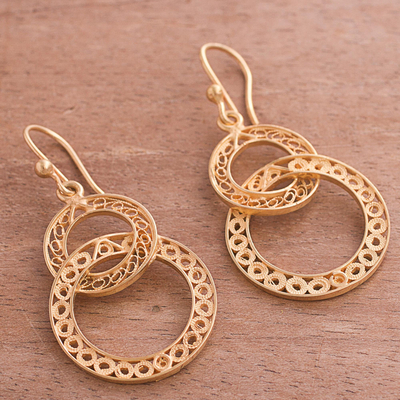 Gold plated filigree dangle earrings, 'Looped in Gold' - Gold-Plated Sterling Silver Filigree Circles Dangle Earrings