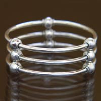 Sterling silver bangle bracelet, 'Cosmic Trio' - Sterling Silver Bangle Bracelet from Indonesia