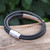 Leather strand bracelet, 'Mighty Strength in Black' - Leather Strand Bracelet in Black from Thailand (image 2b) thumbail
