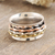 Multi-metal meditation spinner ring, 'Twisted Spin' - Sterling Silver Brass and Copper Meditation Spinner Ring
