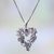 Garnet pendant necklace, 'Heart of the Vineyard' - Heart Shaped Sterling Silver Pendant Necklace with Grapes