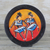Wood decorative plate, 'Dancing Women' - Hand-Painted Wood Dance-Themed Decorative Plate from Ghana
