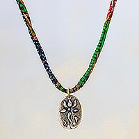 Brass pendant necklace, 'Colorful Lotus Oval' - Oval Lotus Flower Brass Pendant Necklace in Green