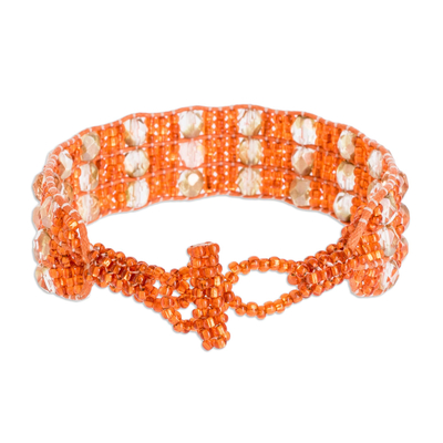 Beaded wristband bracelet, 'Kinship in Orange' - Artisan Crafted Orange Bead Bracelet