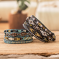 Beaded wrap bracelets, 'Atitlan Nightfall' (pair) - 2 Hand-Woven Beaded Wrap Bracelets in Blue and Black