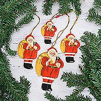 Papier mache ornaments, 'Bringing Gifts' (set of 4) - Papier Mache Santa Ornaments (Set of 4) from India