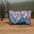 Ikat travel bag, 'Vintage Ikat' - Traditional Ikat Patterned Cosmetic Bag with Zipper Closure
