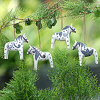 Wood ornaments, 'Dala Courage' (set of 4) - 4 Wood White Dala Horse Ornaments Carved & Painted by Hand
