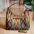 Ikat handbag, 'Colors from the Road' - Colorful Ikat Handbag with Five Exterior Zippered Pockets