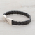 Faux leather braided wristband bracelet, 'Daring Style' - Black Faux Leather Unisex Wristband Bracelet from Guatemala