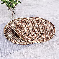 Bamboo and rattan trays, 'Presenting Pikul' (10 and 11 inch, pair) - Set of 2 Handcrafted Woven Flower Motif Thai Rattan Trays