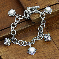 Cultured pearl charm bracelet, 'Moon Echo' - Handcrafted Sterling Silver and Pearl Charm Bracelet