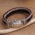 Men's sterling silver and leather braided bracelet, 'Two Brothers' - Men's Sterling Silver and Leather Braided Bracelet from Bali