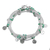 Onyx wrap bracelet, 'Rain Charms in Green' - 925 Sterling Silver Plated Green Onyx Bracelet from Thailand