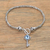 Blue topaz charm bracelet, 'Beauty Unlocked in Blue' - Blue Topaz and Sterling Silver Key Charm Bracelet from Bali