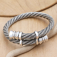 Sterling silver bangle bracelet, 'Luminous Braid' - Polished Sterling Silver Bangle Bracelet Crafted in Bali