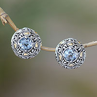 Gold accent blue topaz button earrings, 'Flashing Stars' - Bali Gold Accent Sterling Silver Blue Topaz Button Earrings