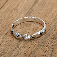 Sterling silver band ring, 'Animal Twist' - Sterling Silver Band Ring with Paw Print Motifs from Bali