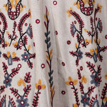 Embroidered cotton skirt, 'Worldly Charm' - Embroidered Floral and Leaf Cotton Skirt with Mirror Beads