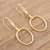 Gold-plated labradorite dangle earrings, 'Wrap Party' - Handmade Gold-Plated Labradorite Dangle Earrings