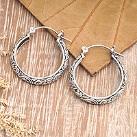 Sterling silver hoop earrings, 'Beauty of Paradise' - Sterling Silver Hoop Earrings with Leaf Motifs from Bali