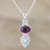 Garnet and blue topaz pendant necklace, 'Sparkling Radiance' - Garnet and Blue Topaz Sterling Silver Pendant Necklace