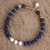 Gold accent lapis lazuli and cultured pearl beaded bracelet, 'Midnight Moonrise' - Gold Accent Cultured Pearl and Lapis Beaded Pendant Bracelet