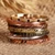 Copper and brass band rings, 'Earth's Triumph' (set of 7) - Set of 7 Copper and Brass Band Rings in a Polished Finish