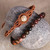 Jade macrame pendant and beaded stretch bracelets, 'Exquisite Duo' (pair) - 2 Jade Macrame Pendant and Beaded Stretch Bracelets in Brown