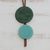 Glass and leather pendant necklace, 'Green Eclipse' - Green Glass and Leather Pendant Necklace from Brazil