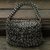 Soda pop-top shoulder bag, 'Shimmery Night' - Black Crochet Recycled Poptop Shoulder Bag from Brazil 